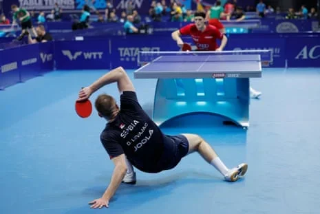 Dimitrije Levajac of Serbia on the defensive in his victory over Luka Mladenovic of Luxembourg in the round-robin stages at the Copper Box Arena